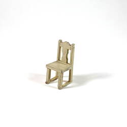 Cream painted wooden chair.