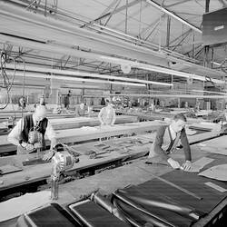 Negative - Female & Male Textile Employees Cutting Out Garment Patterns, 1950s