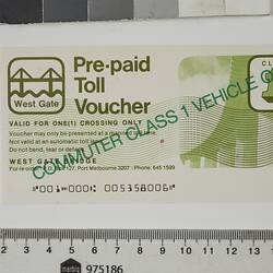 Rectangular white paper voucher with green printing.