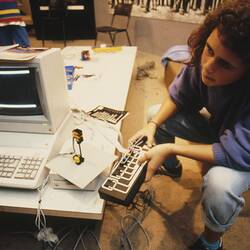 Digital Photograph - Odetta Moore with LEGO Controller, Sunrise School, Melbourne Museum, Russell Street, 1989