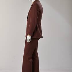 Brown jacket and pants suit. Left profile view.