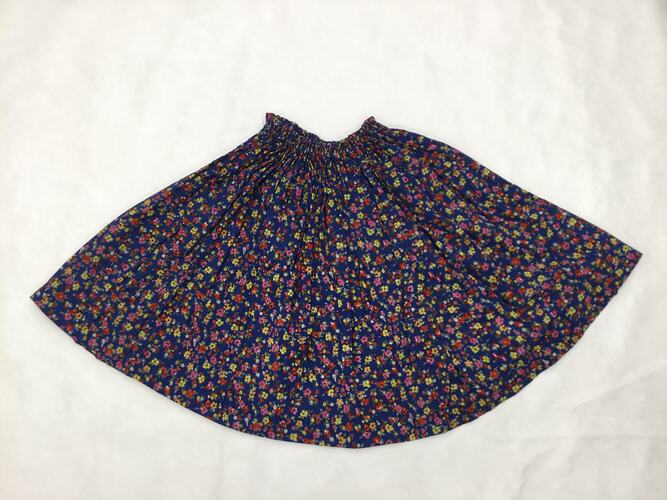 Child's skirt, blue floral print with gathered waist.