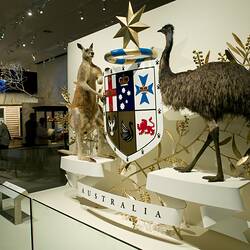 Life size Melbourne Coat of Arms with taxidermied kangaroo and emu supporting central shield.