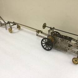 Meccano tractor and plough model.