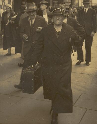 Digital Photograph - Woman Walking down Bourke Street with Suitcase, Melbourne, 1930-1939
