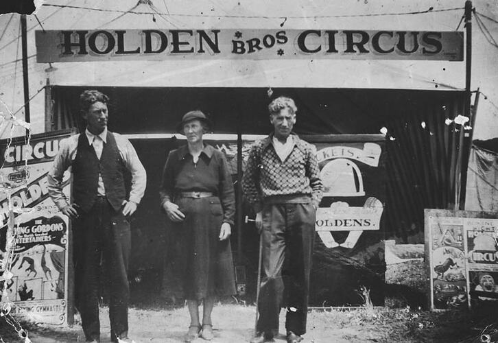 Digital Photograph - Holden Brothers Circus, Two Men & Woman Standing in front of Ticket Box, circa 1930s