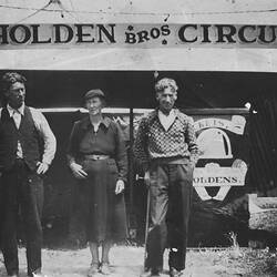 Digital Photograph - Holden Brothers Circus, Two Men & Woman Standing in front of Ticket Box, circa 1930s