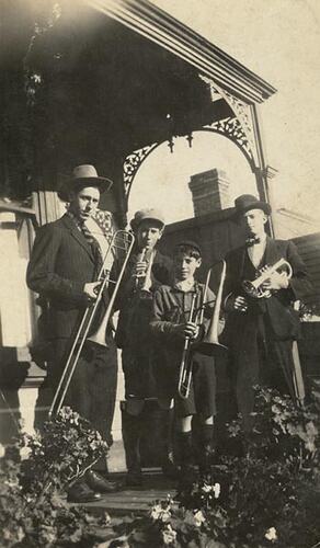Digital Photograph - Holden Brothers Circus, Two Men & Two Boys with Brass Instruments, Verandah of House, Kensington, 1920s