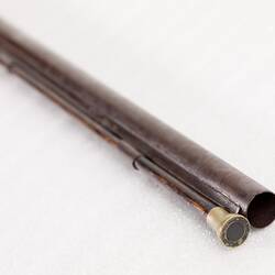 Detail of barrel of single barrelled shotgun.