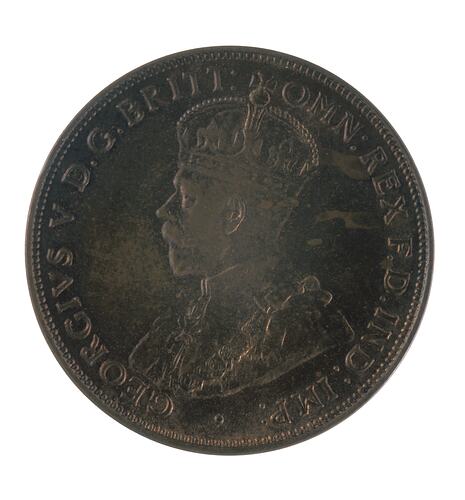 Features crowned and robed bust of George V facing left. Text around.