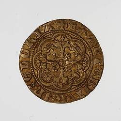 Coin, round, floriated cross with a lis at centre and end of each arm; in the angles, a lion passant.