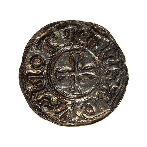 Coin, round, at centre within a circle of dots, a cross pattee; text around, +ADRADVS MOT.