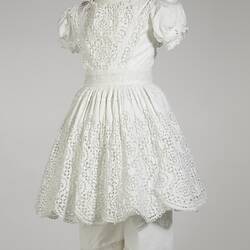 Small white dress and bloomers with lace.