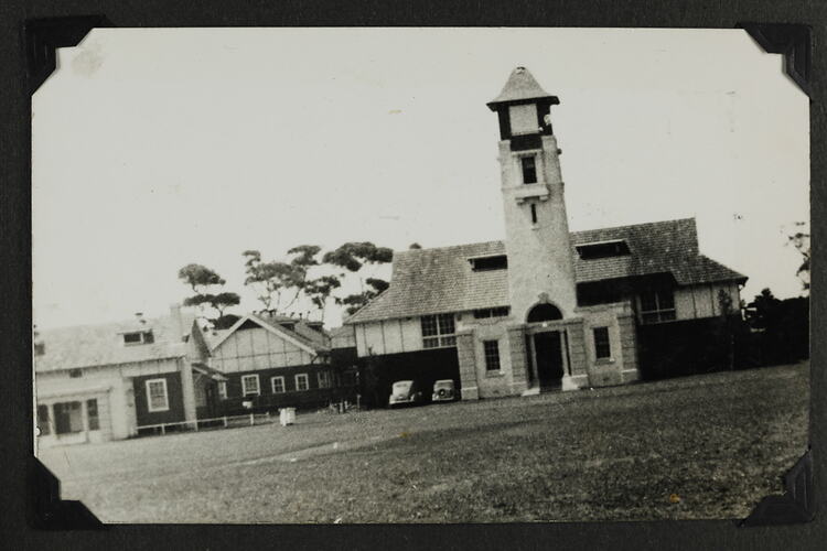 Exterior of military building with tower.
