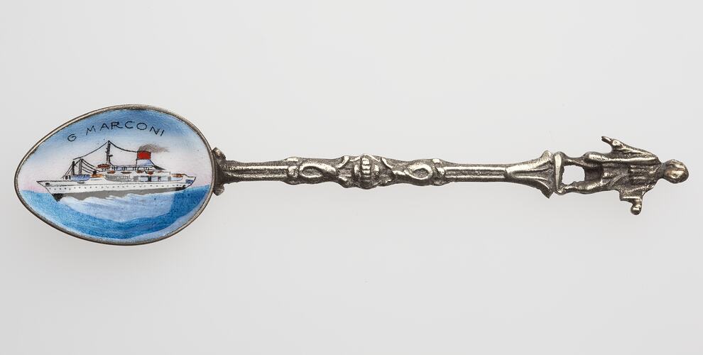 Silver spoon with enamel painted scoop depicting ship.
