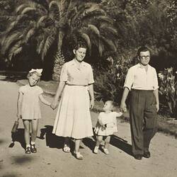 Man, Woman & Two Girls Walking in Royal Botanic Garden, South Yarra, 1951