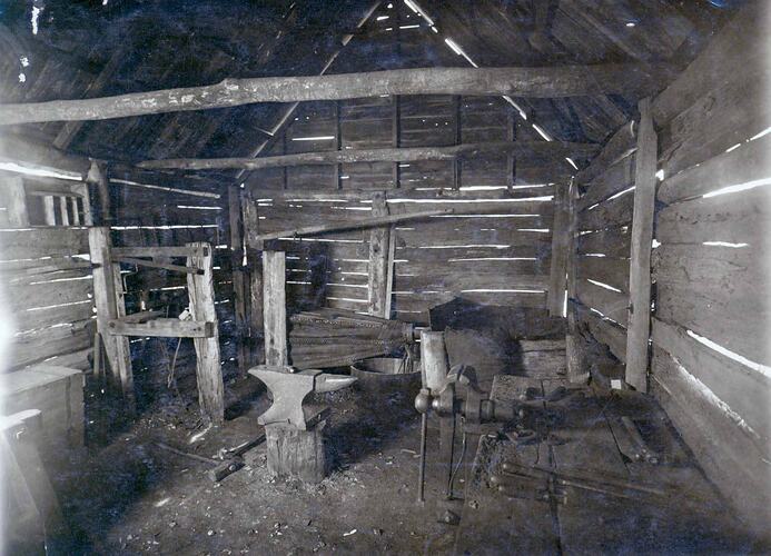 Interior view of the original blacksmith shop ("Smithy").