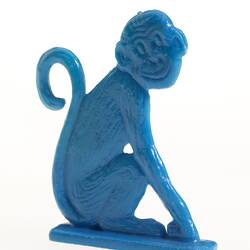 Blue plastic monkey.