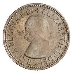 Round silver coin.