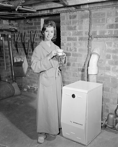 Mobile Industrial Equipment, Woman Modelling with Heating System, Eaglemont, Victoria, 07 Sep 1959