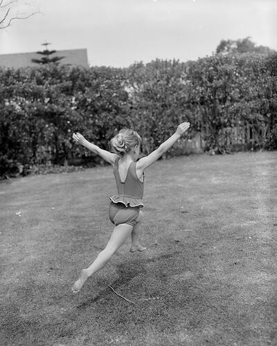 Girl Running in a Garden, Brighton, Victoria, 03 Oct 1959