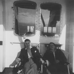 Digital Photograph - James & Harry Forbes Seated Deckside, Onboard Fair Sky, Sitmar Line, Jul 1961