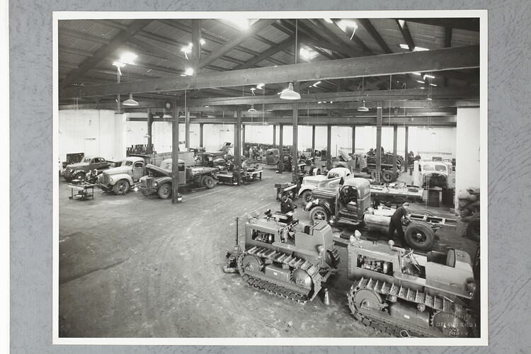 Monochrome photograph of a showroom interior.