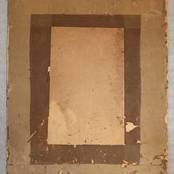 Back of photograph showing cardboard.