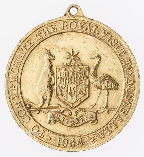 Medal with Australian coat of arms. Text around.