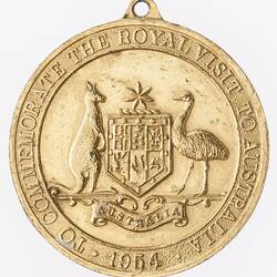 Medal with Australian coat of arms. Text around.