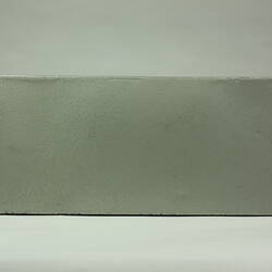 Side of rectangular metal box.