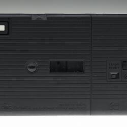Back of black plastic camera.
