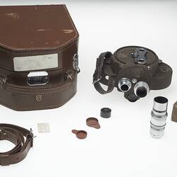 Movie camera with case and accessories.