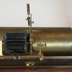 Scientific instrument, detail of brass cylinder and pen.