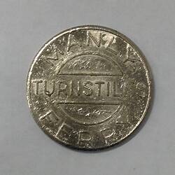 Round ferry transport token.