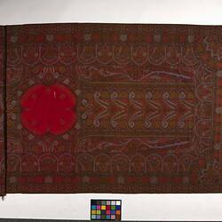 Finely woven red twill tapestry shawl with paisley design in red, orange, black, white and blue.