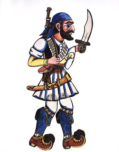 Two dimensional acrylic puppet of a bearded man wearing a white tunic, blue scarf on head, holding a sword.