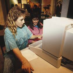 Digital Photograph - Students working on an Apple IIE, Sunrise School, Melbourne Museum, Russell Street, 1989