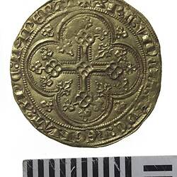 Coin, round, within a circle of beads, quatrefoil with lis on each spandrel containing a floriated cross.
