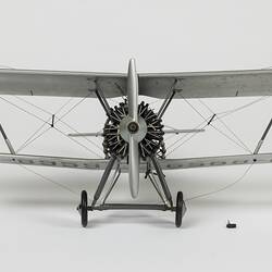 Model of silver aeroplane. Front view.