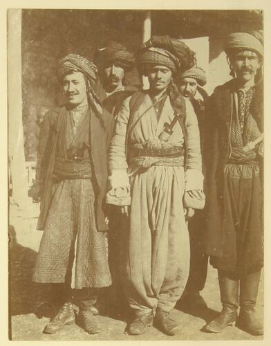Kurdish men in traditional clothing.