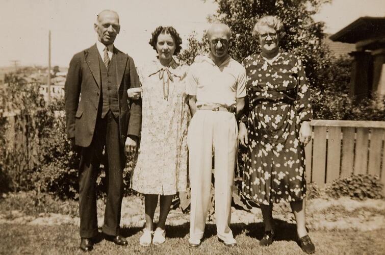 Digital Photograph - Woman in Maternity Dress, with Father, Mother & Brother, Front Garden, Prahran, 1939