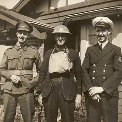 Digital Photograph - Three Men in Uniforms in Front of House during World War II, Moonee Ponds, 1941