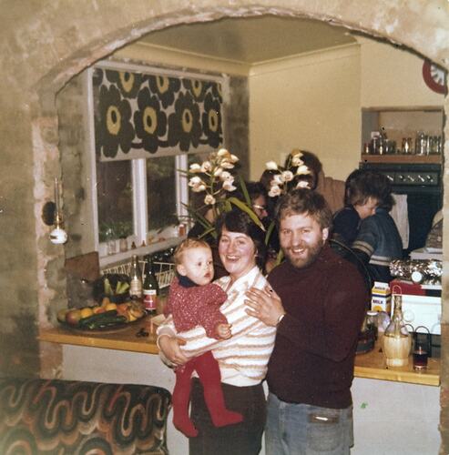 Family Celebrating Girl's First Birthday in Kitchen, Fitzroy, 1978