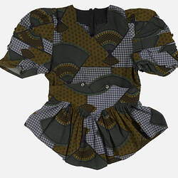 Brown, grey and blue patterned women's short sleeved top.