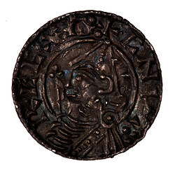 Coin, round, bust wearing pointed helmet facing left, in front, sceptre; text around, CNVT RECX A.