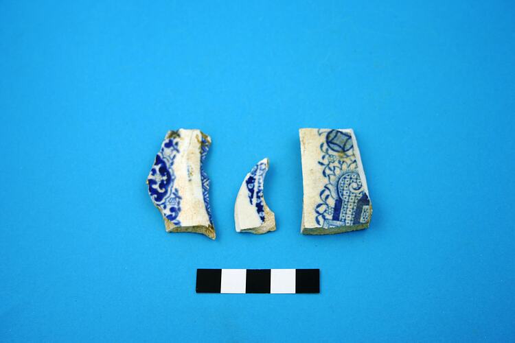 Three earthenware fragments.