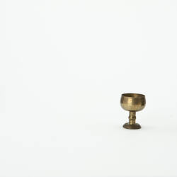 Small brass coloured metal goblet