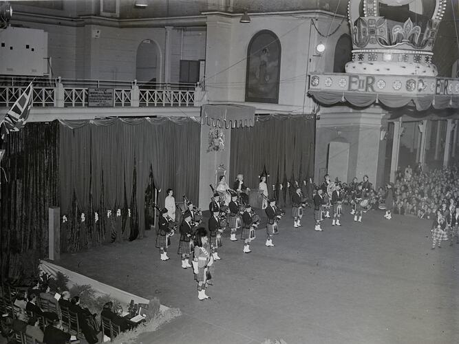 Bagpipe Band Performing at Coronation Celebrations for Queen Elizabeth II, Royal Exhibition Building, Carlton, 1953