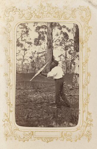A man demonstrating the use of weaponry, Victoria, 1872